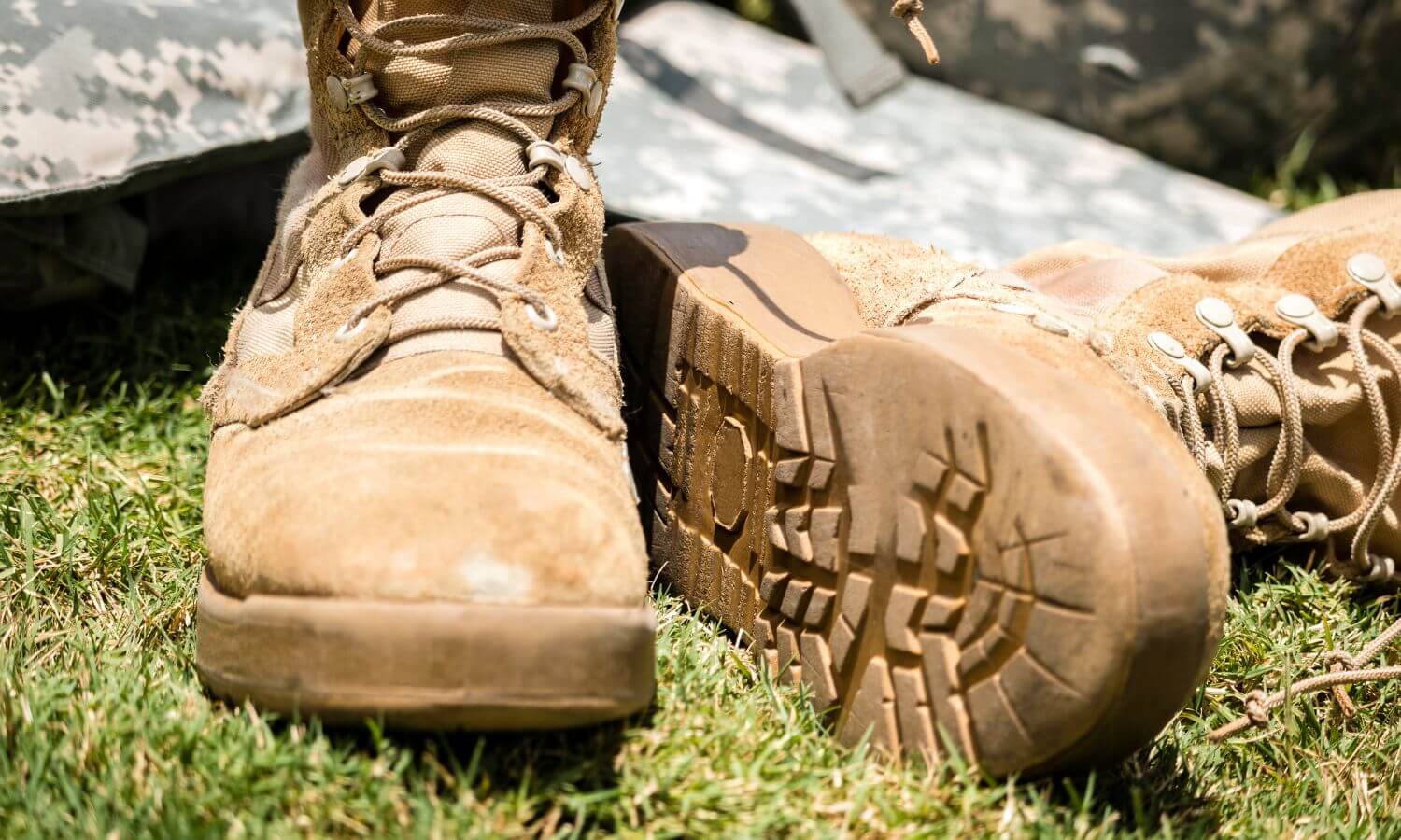 Boots of a soldier experiencing challenges of military life and deployment stress