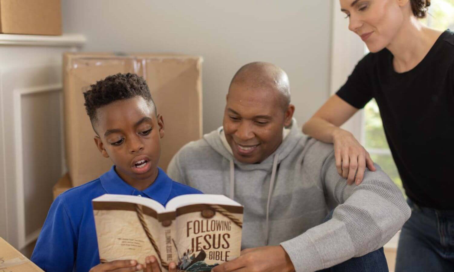 A family reading biblical parenting verses